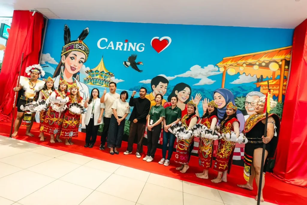 Caring Pharmacy Mural Art Unveiling Ceremony l Farley Mall , Kuching 5 Group photo in front of Caring Pharmacy Farley Mall Mural Art