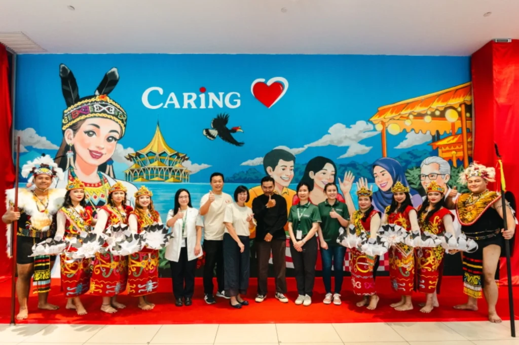 Group photo at Caring Farley Mall mural art